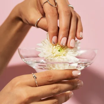 Hand spa treatment with flower bowl at Dubai beauty salon